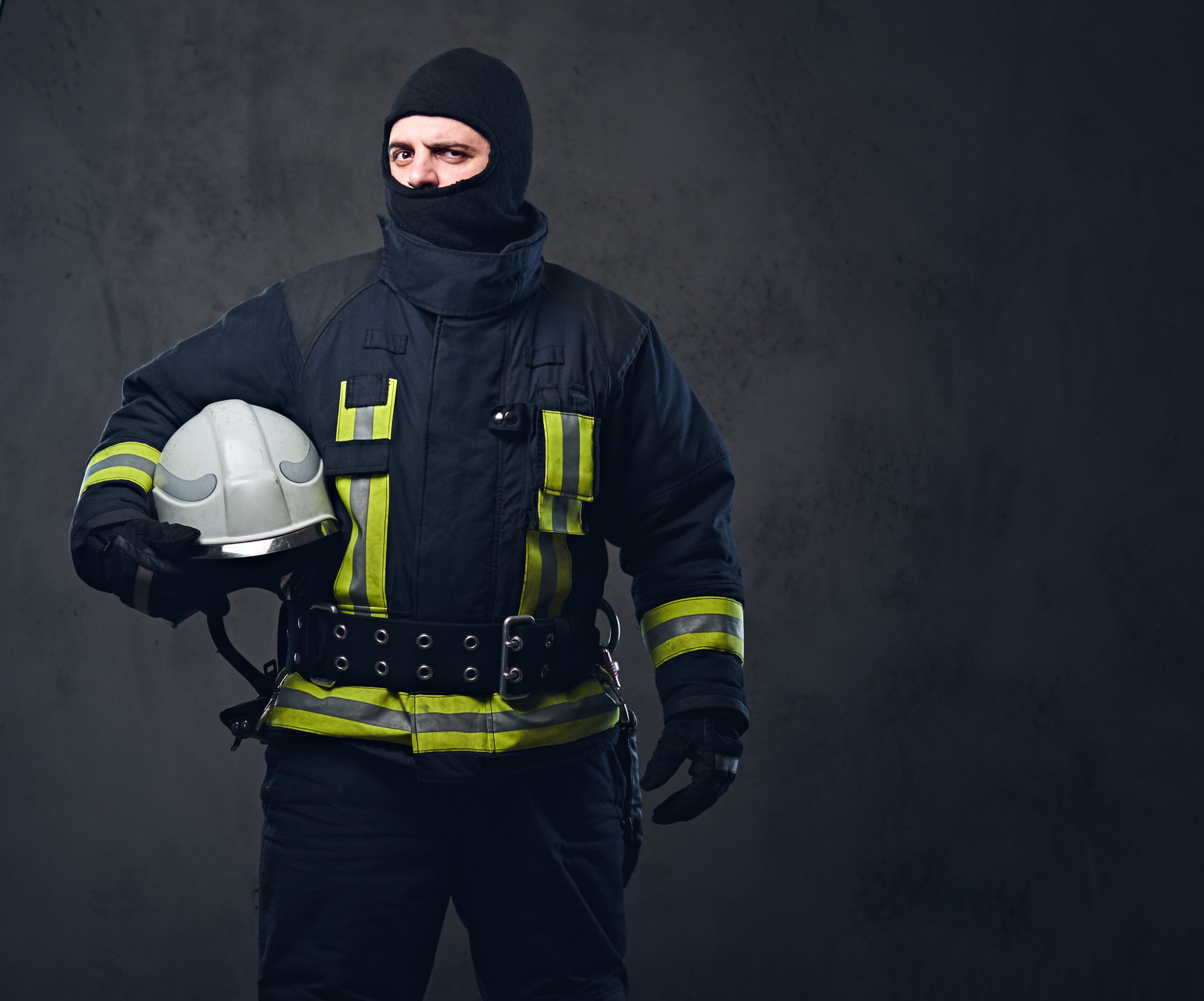 firefighter-in-a-uniform-holds-safety-helmet-2021-08-28-05-11-24-utc