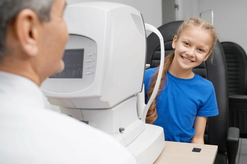girl-looking-at-camera-and-laughing-while-checking-CHS39KC-scaled